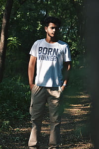 Man Wearing White Shirt and Brown Cargo Pants thumbnail