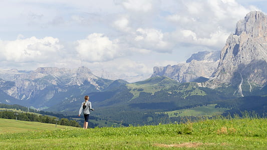 woman walking across the grassland thumbnail
