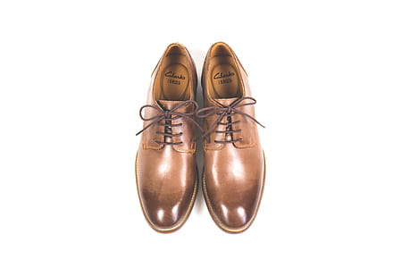 pair of men's brown Clarks leather dress shoes with white background thumbnail