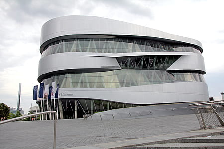 gray 3-storey building under gray sky thumbnail