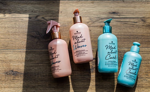 four pink and teal pump bottles thumbnail