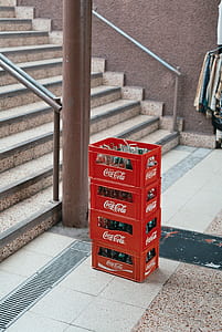 four Coca-Cola plastic crates near brown ceramic upstairs thumbnail