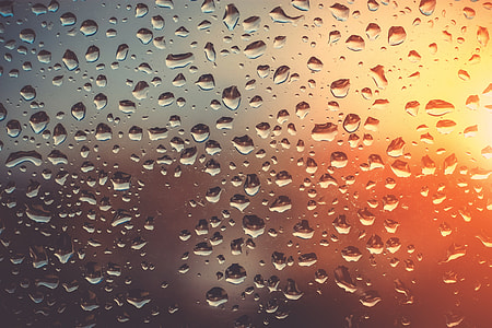 Abstract shot of rain on glass window thumbnail