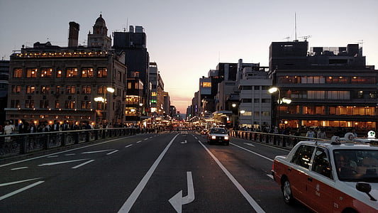 white and orange sedan thumbnail