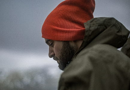 man wearing red beanie hat thumbnail