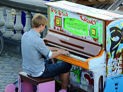 man playing piano thumbnail