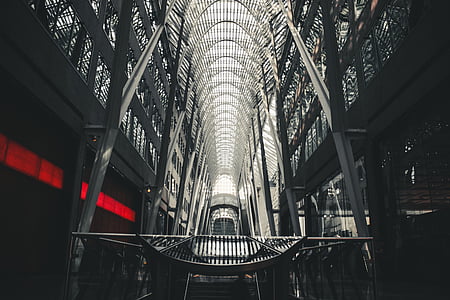 grayscale photography of state of the art building interior thumbnail