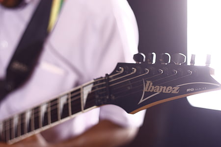 close-up photography of black Ibanez guitar thumbnail