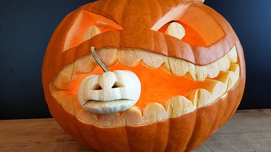 pumpkin head on brown table thumbnail