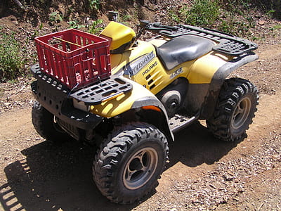 red basket on yellow and black ATV thumbnail