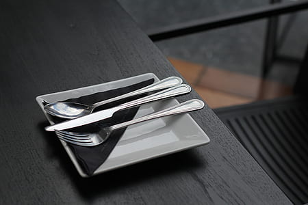 fork, knife, and spoon on plate thumbnail