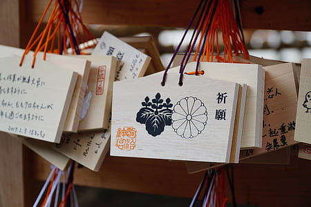 selective focus photo of kanji text hanging signage thumbnail