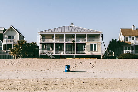 blue plastic drum container on seashore thumbnail