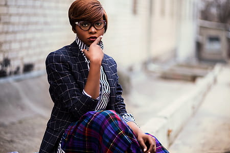 Photo of Woman Holding Her Lips While Sitting thumbnail
