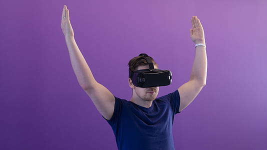 Photography of Man Using Virtual Reality Headset thumbnail
