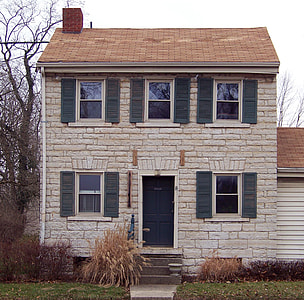 photo of white 2-story concrete house thumbnail