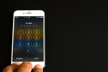 person holding post-2016 iPhone thumbnail