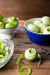 sliced apples in blue bowl thumbnail