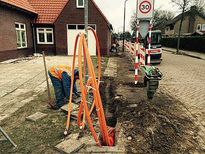 man digging up hole thumbnail