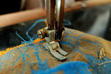 selective focus photo of a sewing machine thumbnail