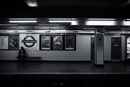 A man waits alone on the tube platform on the London Underground thumbnail