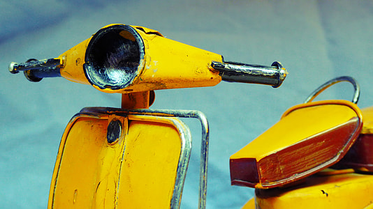 yellow and gray motor scooter thumbnail