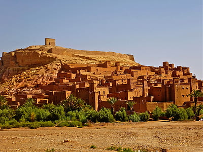 brown concrete village at daytime thumbnail