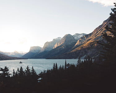 landscape photography of lake near mountain thumbnail