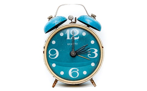 blue and brown analog alarm clock thumbnail