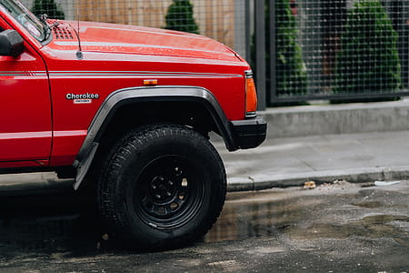 Old red Jeep Cherokee thumbnail