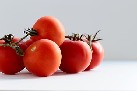 tilt-shift photography of red tomatoes thumbnail