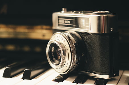 black and gray FED camera on piano thumbnail