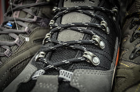 black and gray lace-up shoe close-up photography thumbnail
