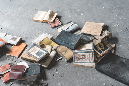 assorted-title book on ground thumbnail