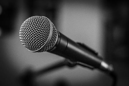 selective focus photography of black and grey microphone thumbnail