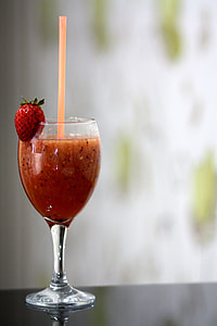 selective focus photography of filled wine glass with straw thumbnail