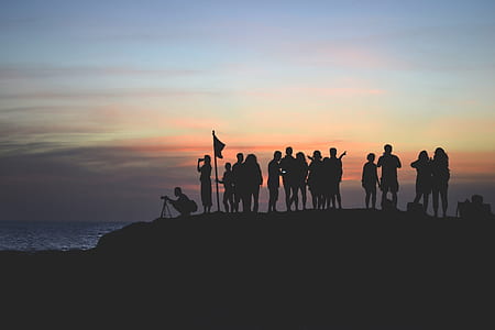 silhouette group of people on mountain thumbnail