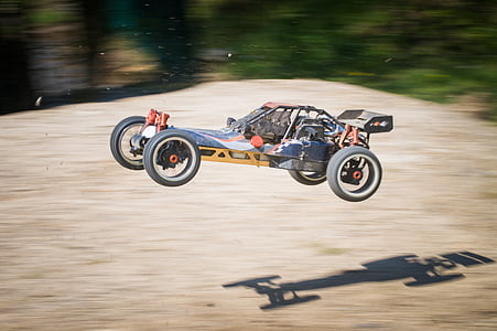 yellow and gray go kart toy during daytime thumbnail