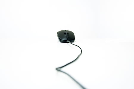 closeup photography of black corded mouse thumbnail