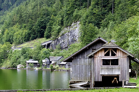 brown dock at side of body of water thumbnail