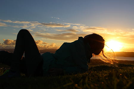 woman lying on grass thumbnail