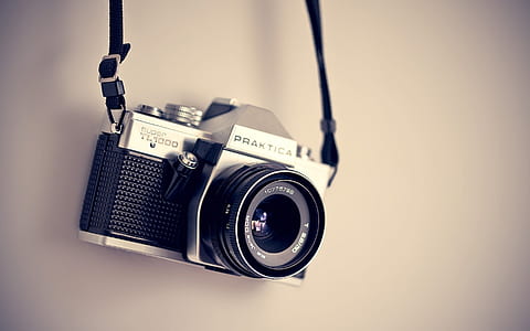 black and Praktica DSLR camera thumbnail
