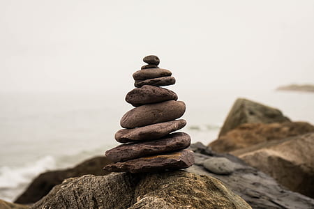 pile on stones on rock at daytime thumbnail