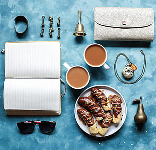 coffee mug and plate on blue surface thumbnail