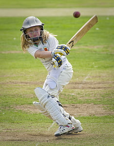 cricket player holding cricket bat during daytime thumbnail