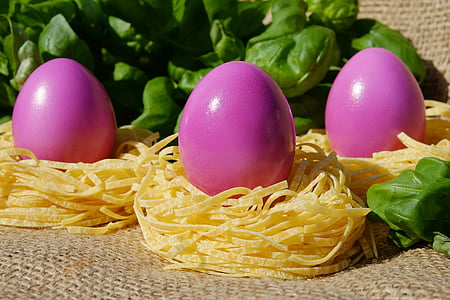 three pink poultry eggs on pasta thumbnail