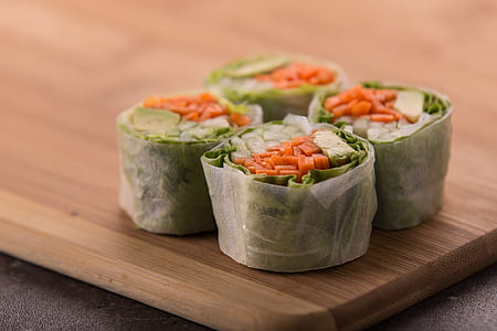 diced vegetables with wrappers on edge of chopping boards thumbnail
