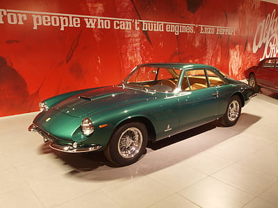 vintage green car inside showroom thumbnail