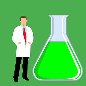 Scientist or researcher standing next to chemical flask. thumbnail