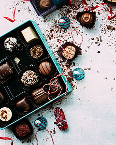 chocolates in brown and blue box thumbnail